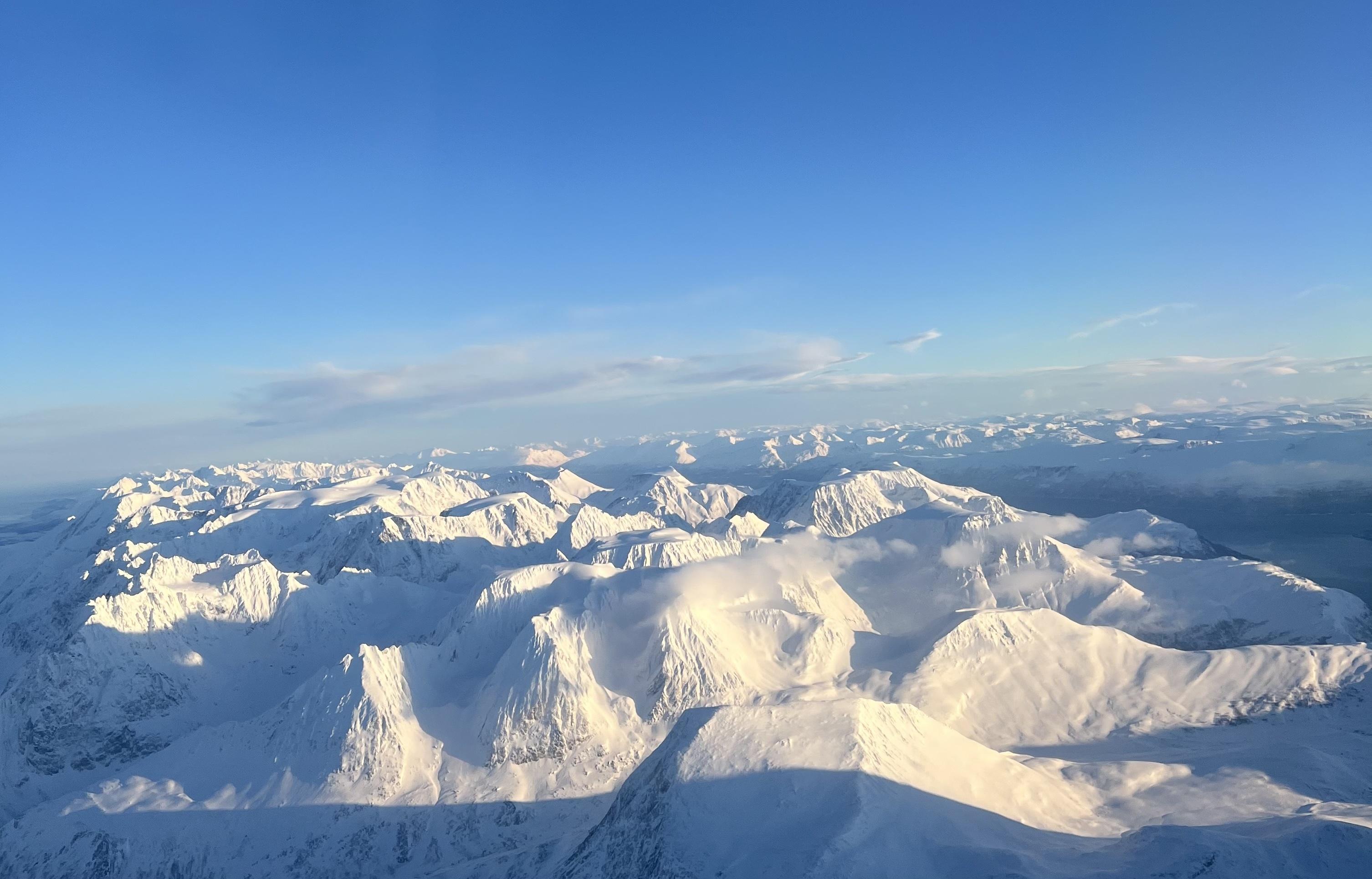 Snow-covered mountain ranges from above